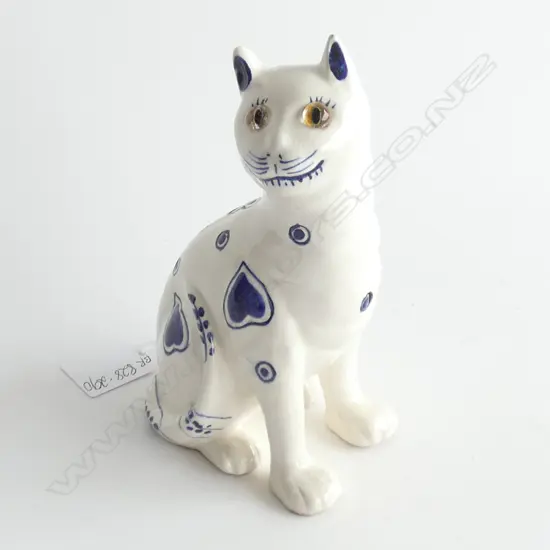 A Galle style faience cat,